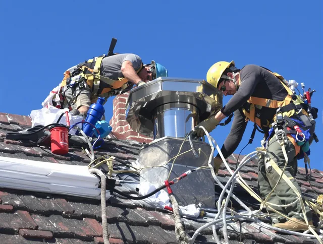 Protective chimney cap installed by Ridgefield Chimney Sweep in Ridgefield, CT