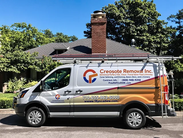 Ridgefield Chimney Sweep technician removing creosote safely in Ridgefield, CT